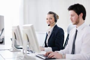 Image of two call center agents providing answering service in Colorado