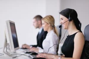 Image of three call center agents providing answering service in Illinois