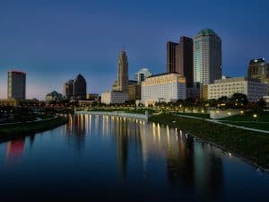 Image of a river and skyline of a city in Ohio