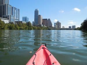 Image of downtown Austin, TX from a kayak on Lady Bird Lake