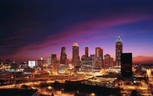 Image of the city of Atlanta, Georgia with the sun on the horizon