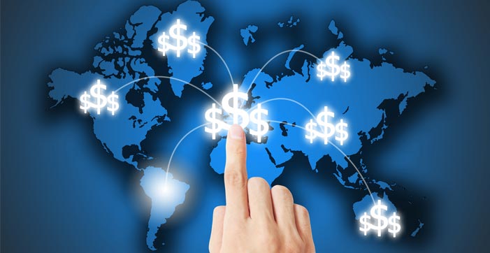 Image of a hand pointing to dollar signs on a map as they grow their business with a franchise answering service