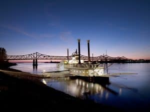 Image of a boat on a river at dusk in Mississippi