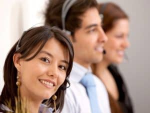 Image of three call center agents providing answering service in Mississippi