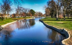 Image of a town and canal on a sunny day in Nebraska