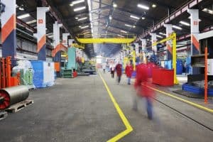 Image of a busy manufacturing plant that uses an Employee Call Out Line from MAP Communications