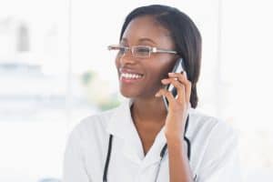 Image of a healthcare professional using a HIPAA compliant doctors answering service