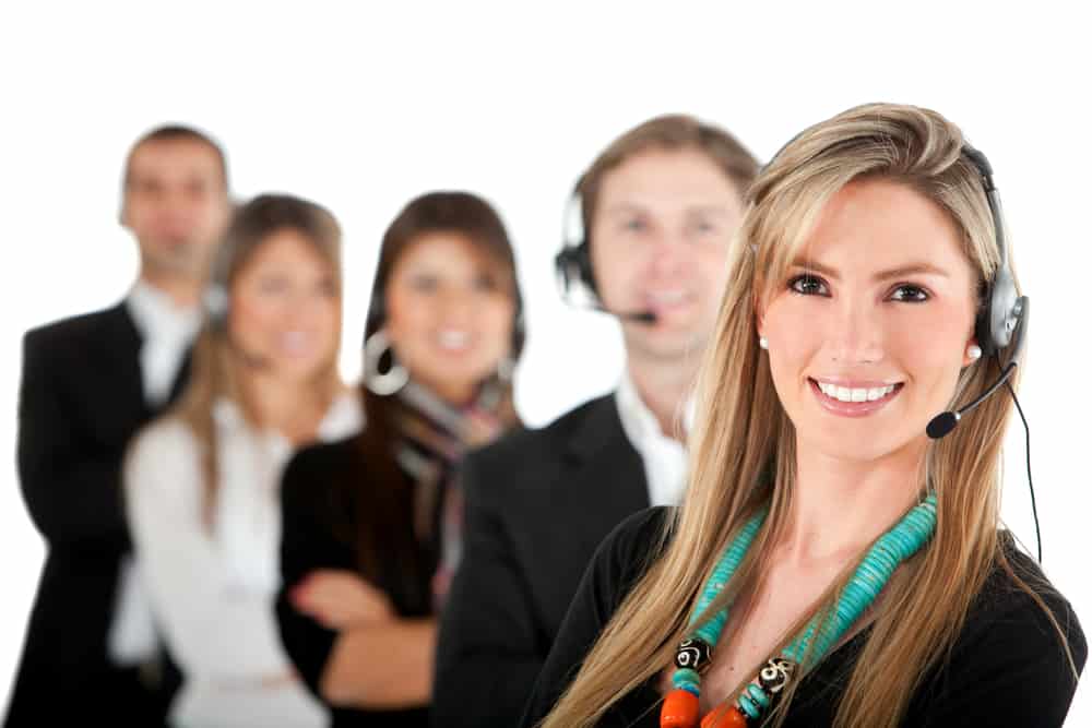 Image of a group of agents who provide call center services for telecommunication companies